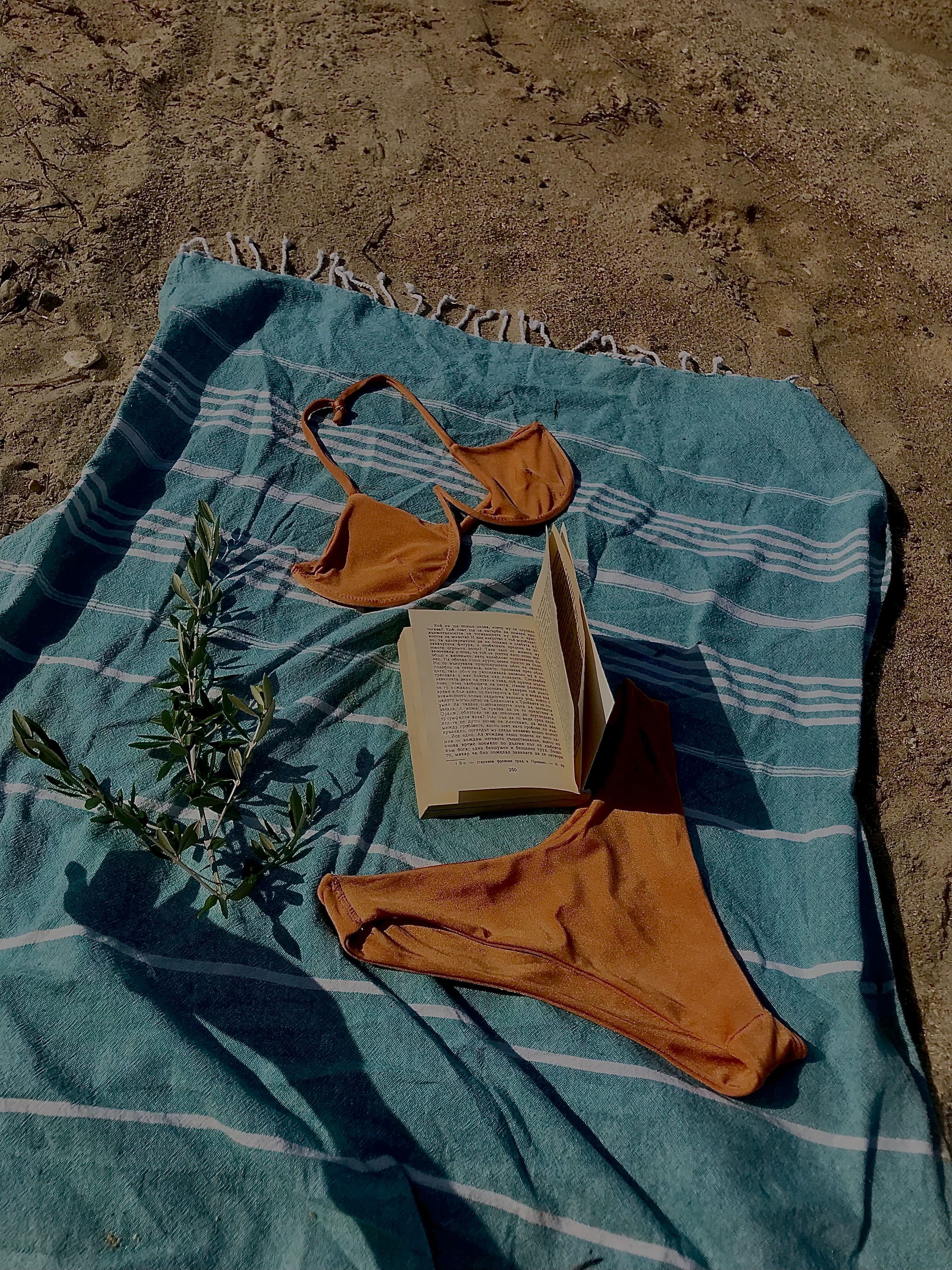 Custom bikini flat lay with swimwear fabric and trims for Mexico manufacturing